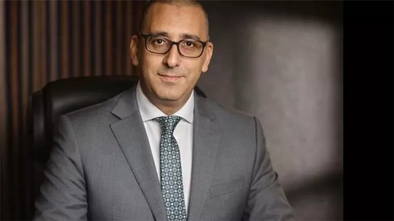 «قرضي هولدينج» تبيع أسهماً في 
